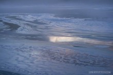 Cloud Reflection On Ice