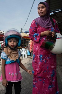 Mother and child motorcyclists           